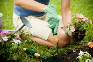 woman performing landscaping services